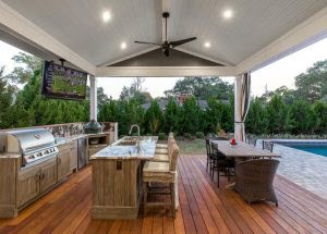 pergola with an outdoor kitchen